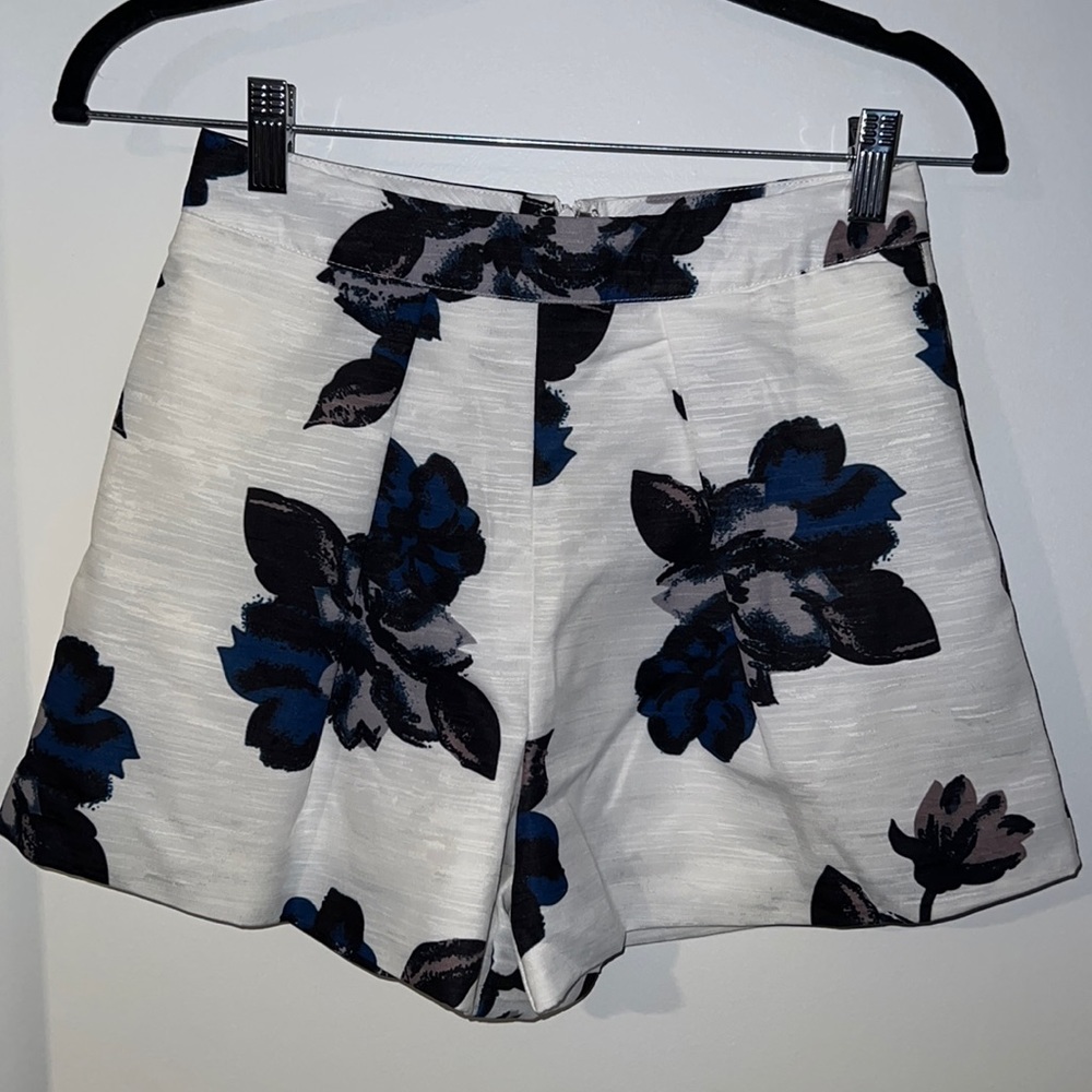 White floral high waisted shorts. US size small